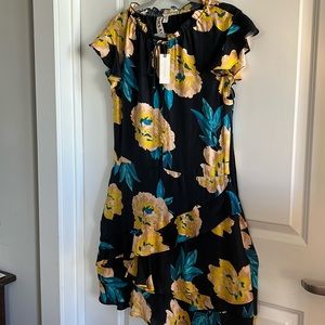 Floral print dress purchased from Anthropologie and the designer is Dolan.